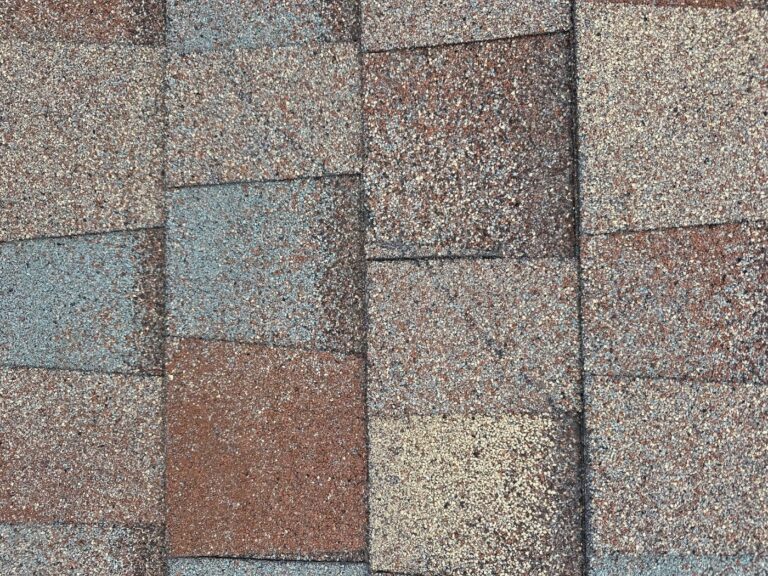 Close-up of weathered shingles on a Thornton roof